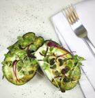 Avocado with egg and microgreens