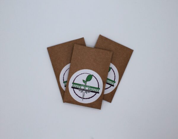 three sets of seeds in paper packets with logo sticker