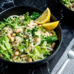 rice salad with microgreens and lemon wedges
